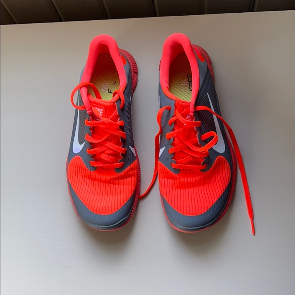 Women’s orange Nike shoes